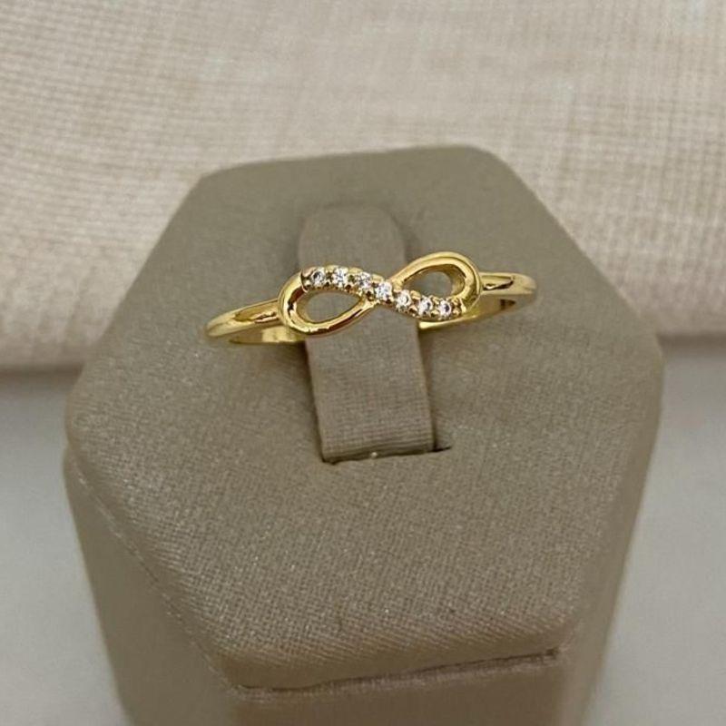 Anel Símbolo Infinito Cravejado com Zircônias Banhado a Ouro 18k