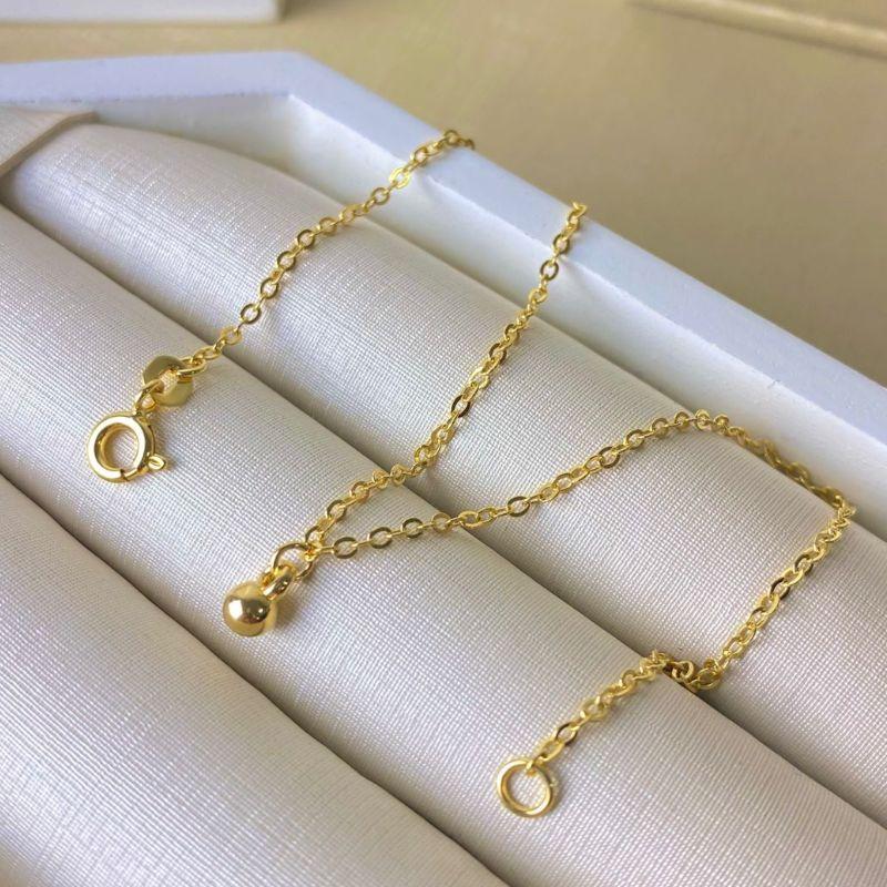 Tornozeleira Bolinha Lisa Banhada a Ouro 18k com Corrente Fina 24 cm e Fecho Bóia